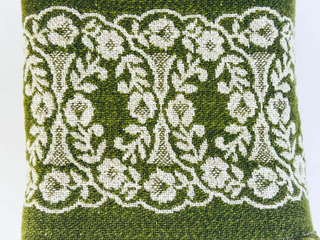 Close-up of floral jacquard pattern with symmetrical mid-century styling