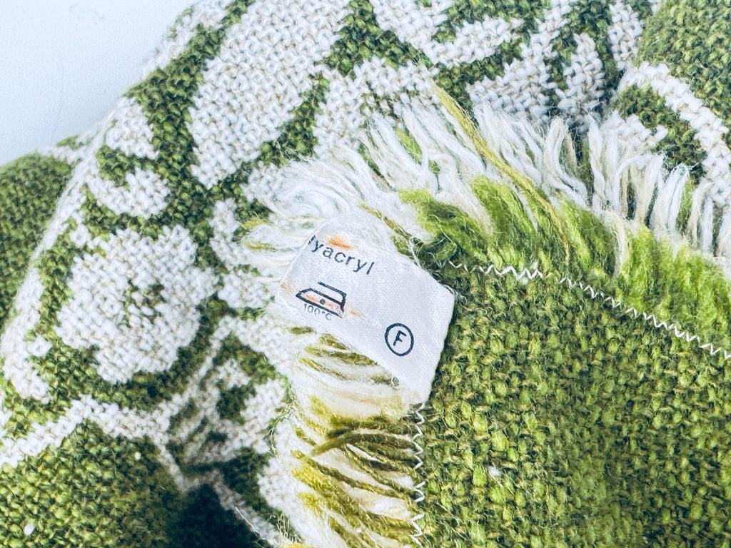 Label close-up showing acrylic fibre content and laundering care instructions