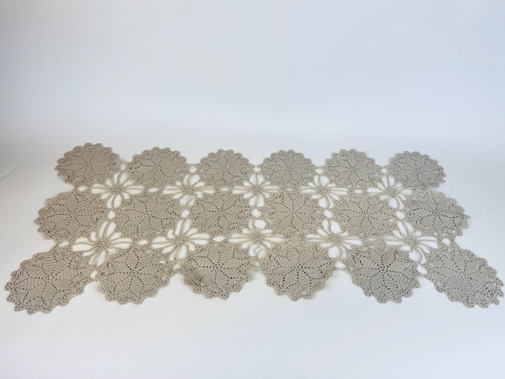 Slightly angled view to highlight three-dimensional texture of crocheted lace