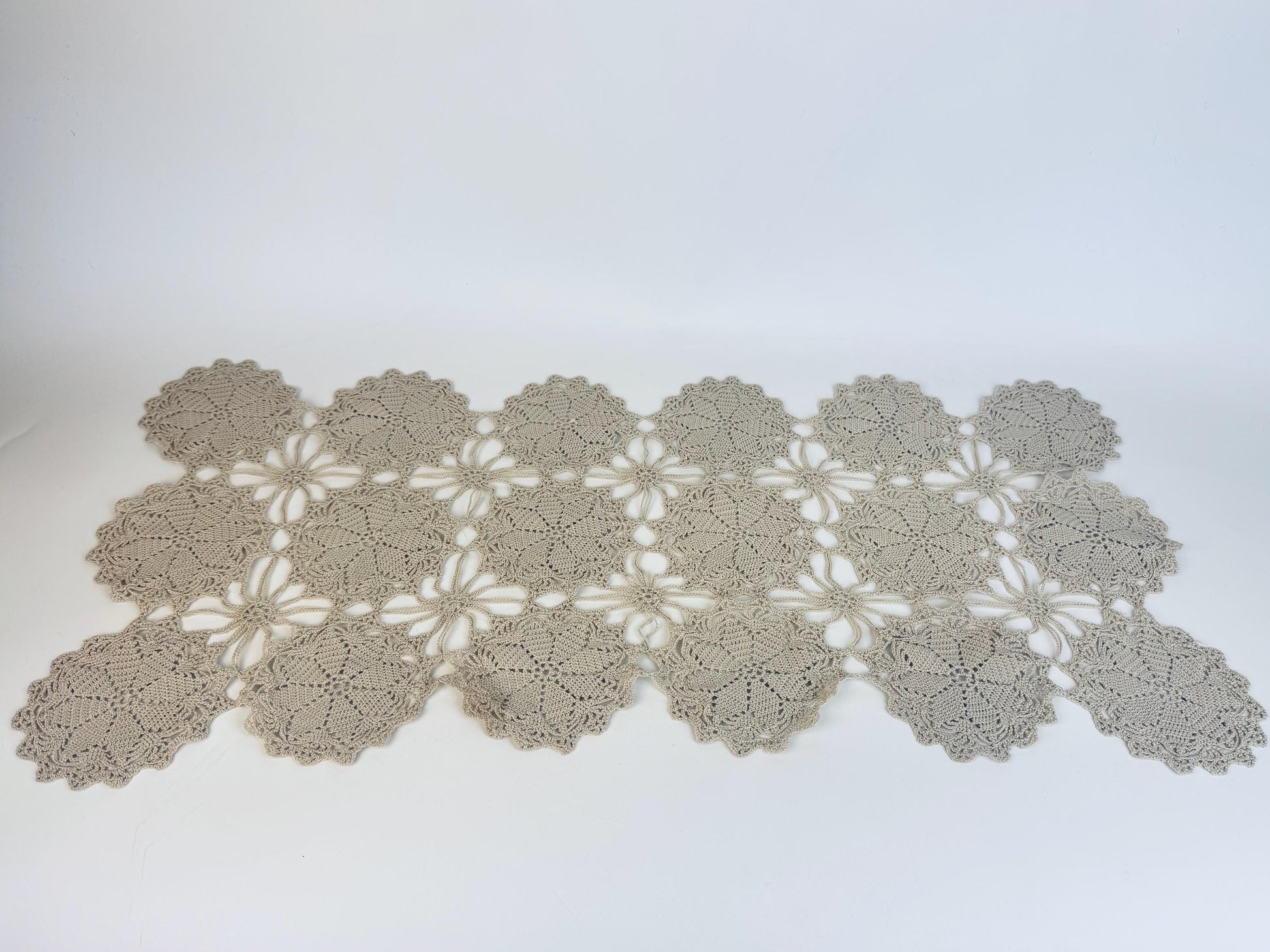 Slightly angled view to highlight three-dimensional texture of crocheted lace
