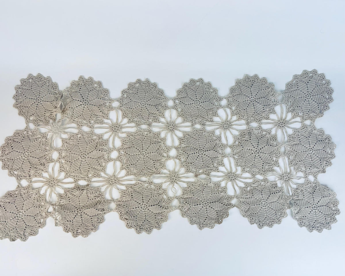 Close-up of symmetrical circular lace medallions
