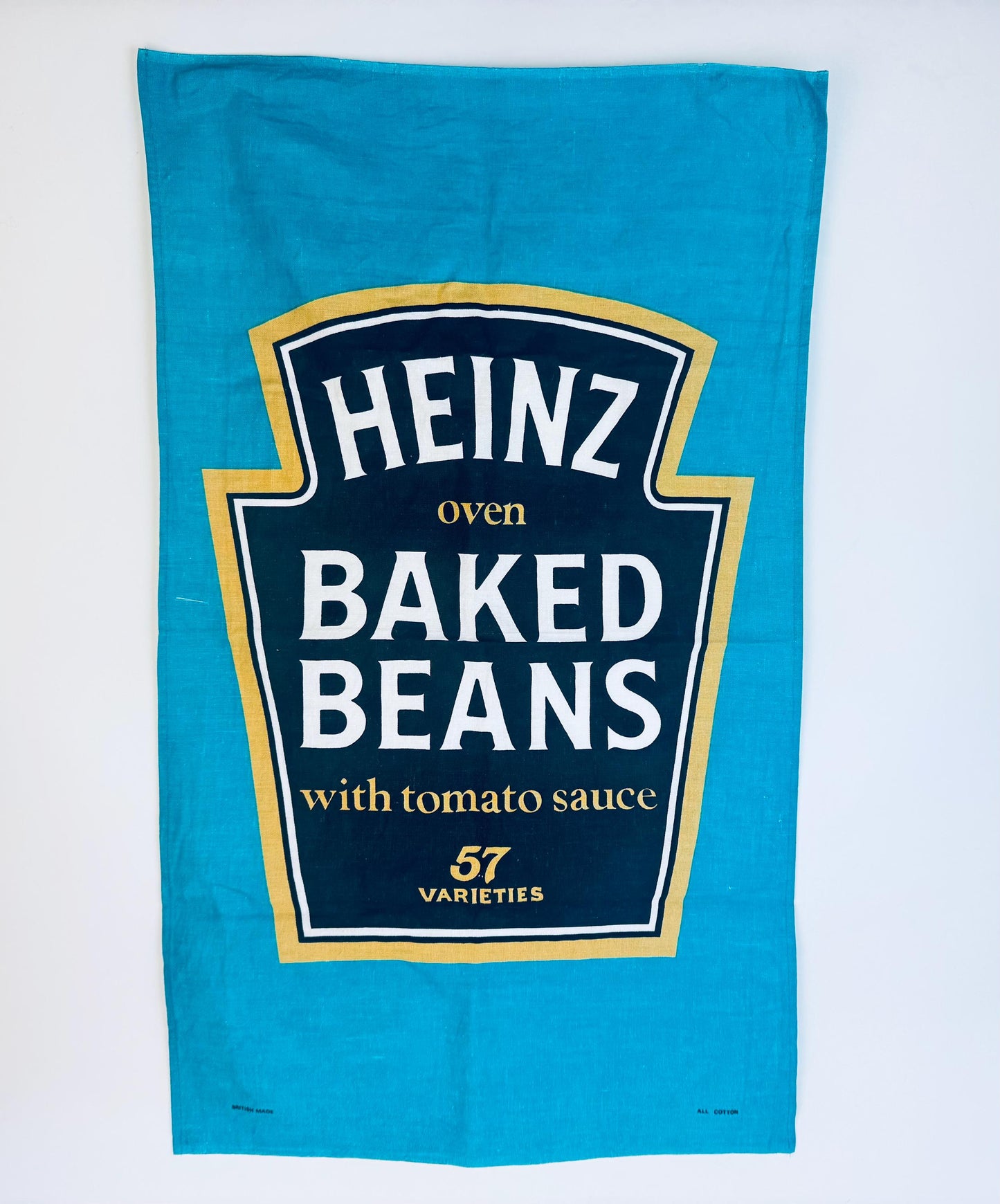 Heinz baked beans label on a blue towel