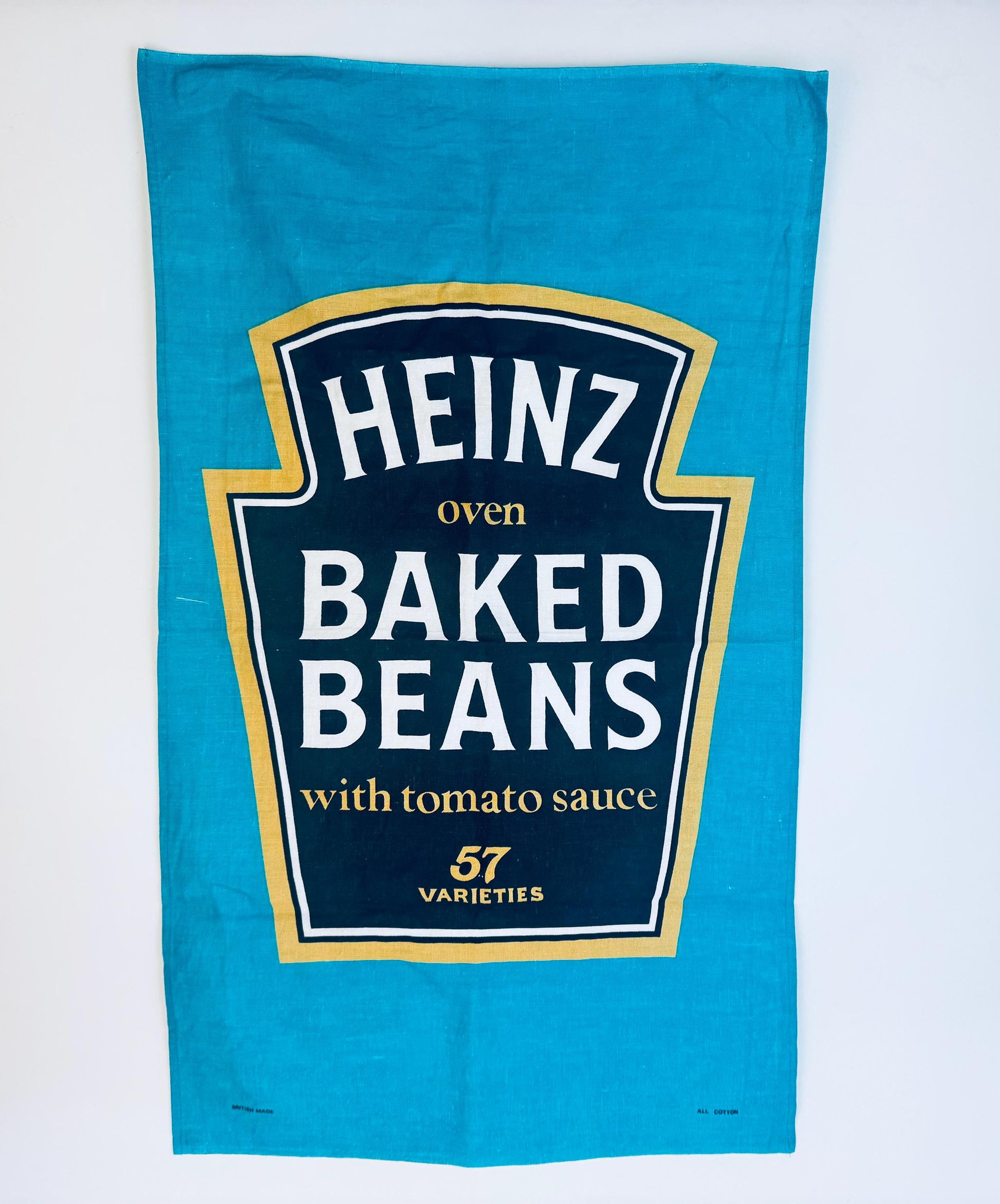 Heinz baked beans label on a blue towel
