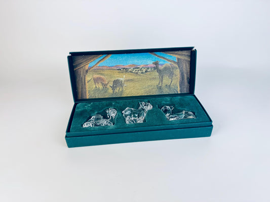 Vintage Marquis by Waterford crystal nativity animals set of three displayed in original green presentation box with illustrated lid.