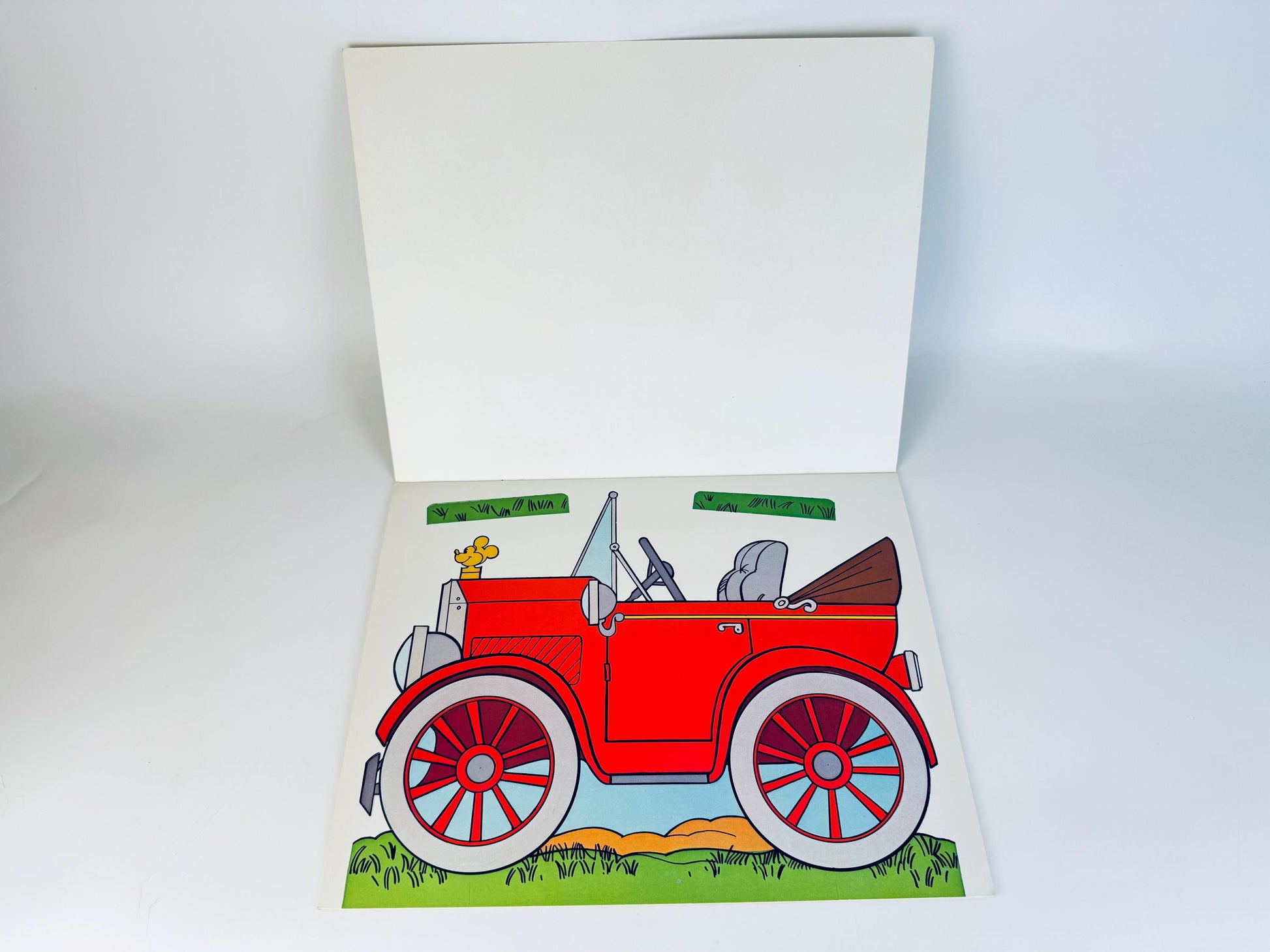 Interior page featuring red convertible car cut-out accessory for Mickey and Minnie paper dolls