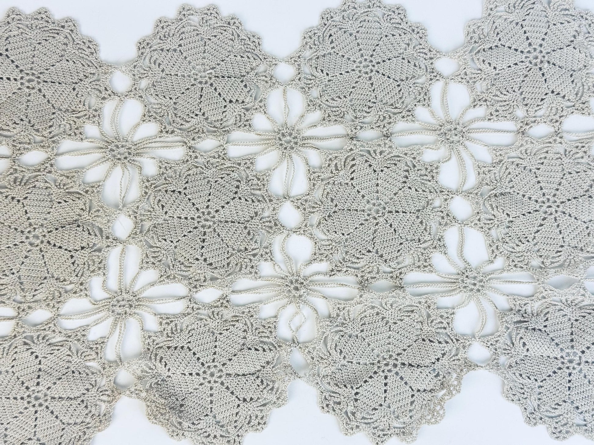 Detailed midsection showing airy joins between floral motifs