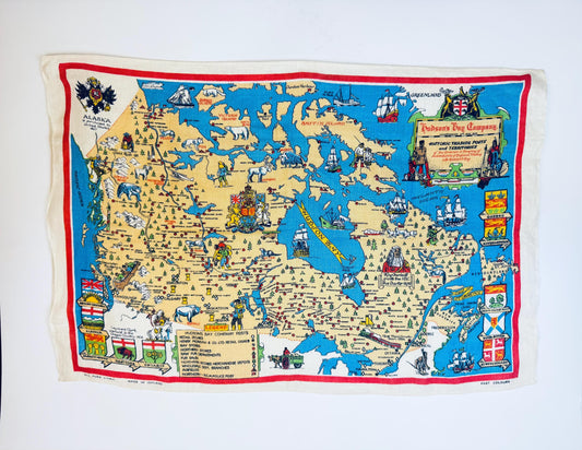Full view of Hudson’s Bay Company linen tea towel with colourful illustrated map of Canada