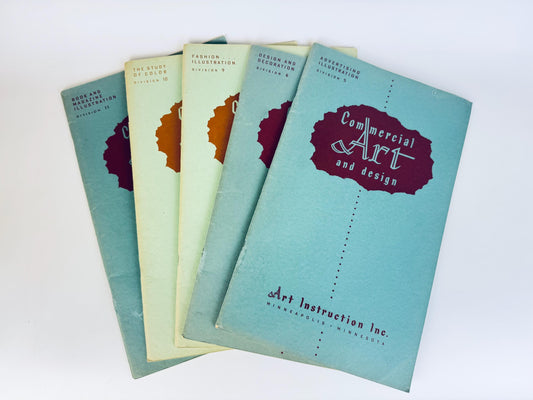 Set of vintage art instruction books on a white background