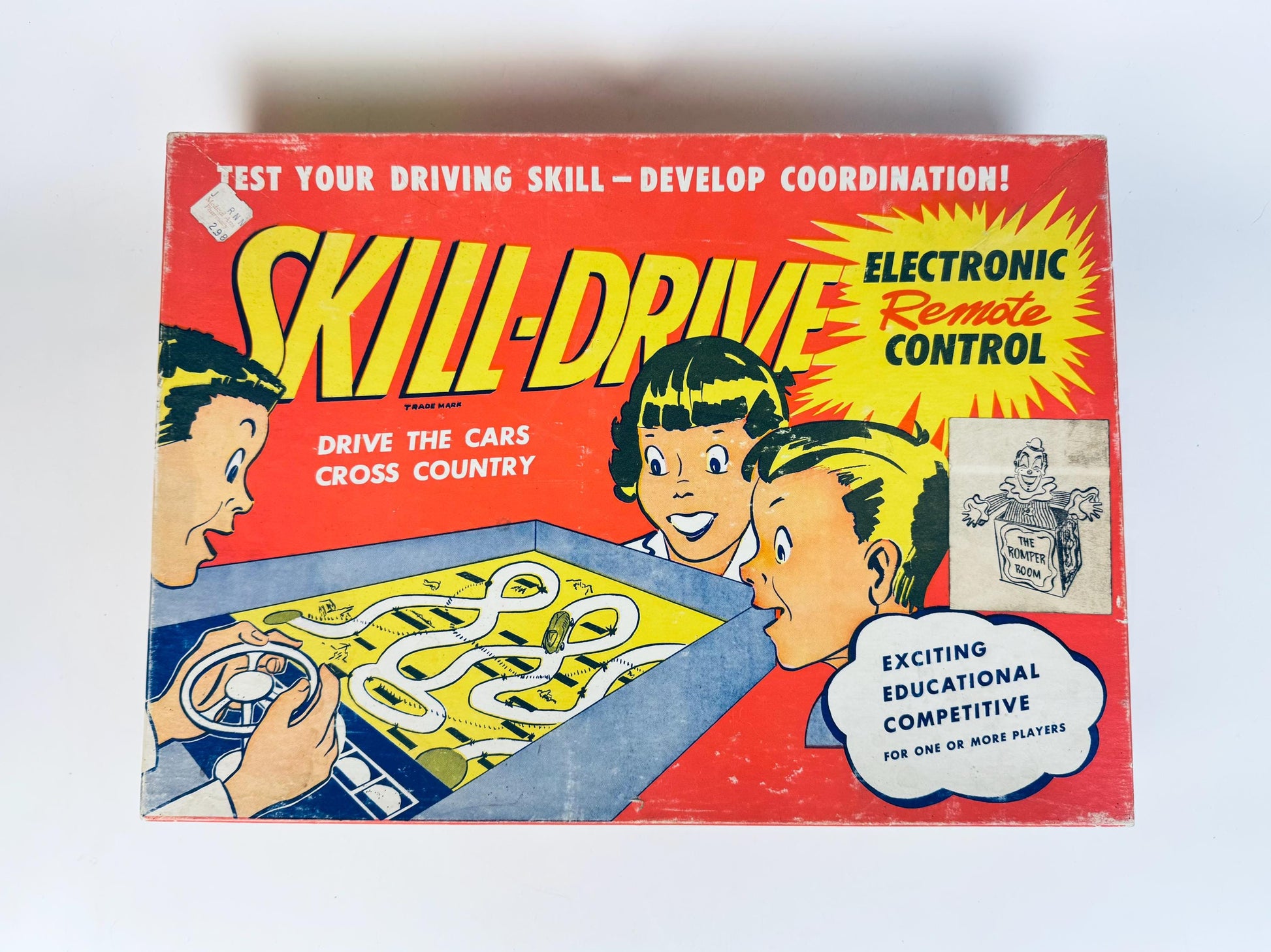 Vintage 'Skill-Drive' toy packaging with colorful graphics and text on a white background