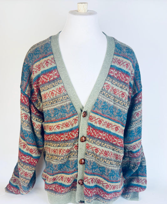 Patterned cardigan on a mannequin against a white background