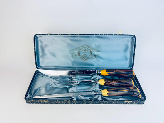 Vintage 1960s faux-antler Bakelite carving set with Sheffield steel knife, fork, and sharpener in blue satin-lined Glo-Hill Connoisseurs Choice box.