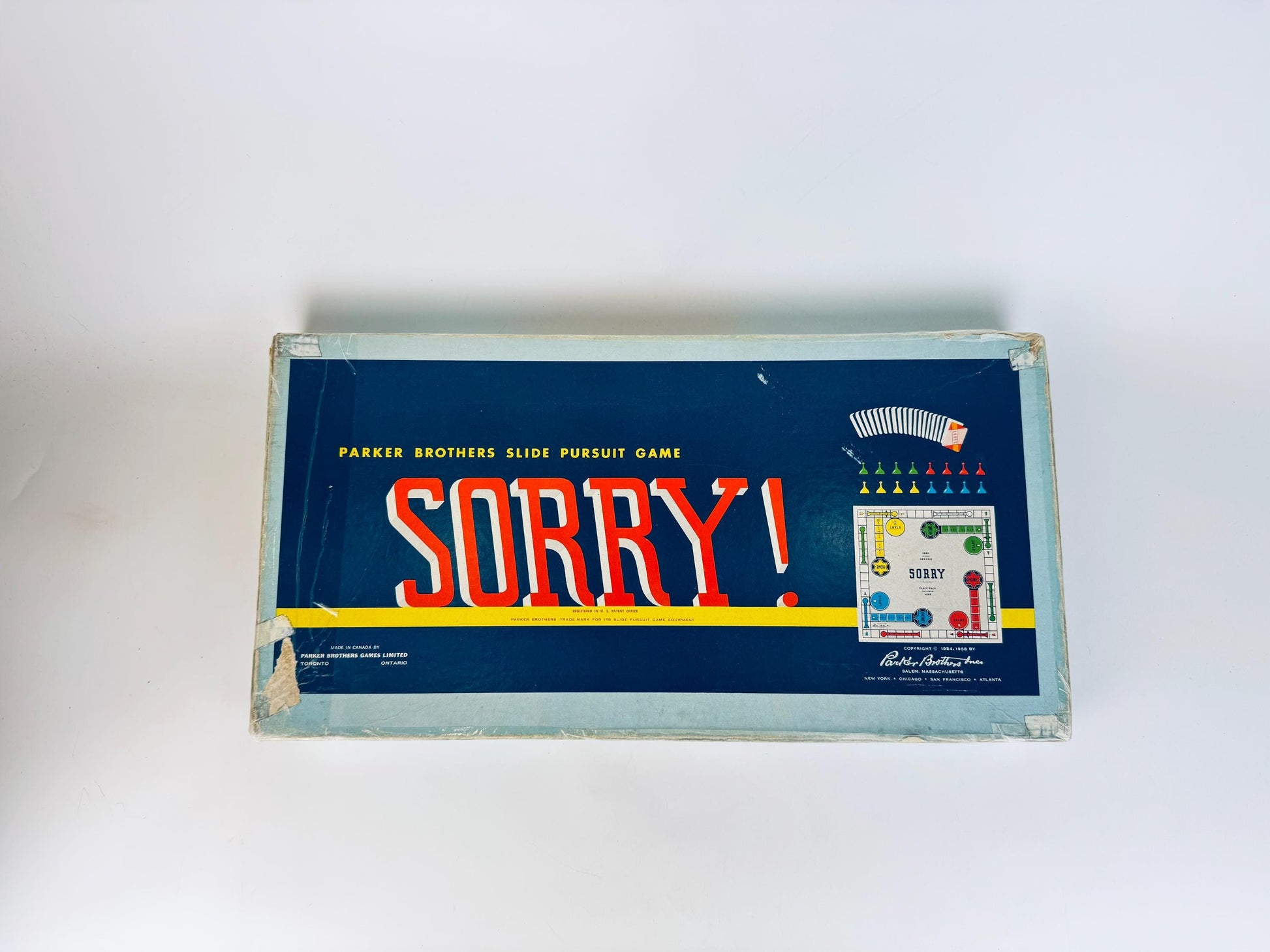 Vintage 'Sorry!' board game box by Parker Brothers on a white background
