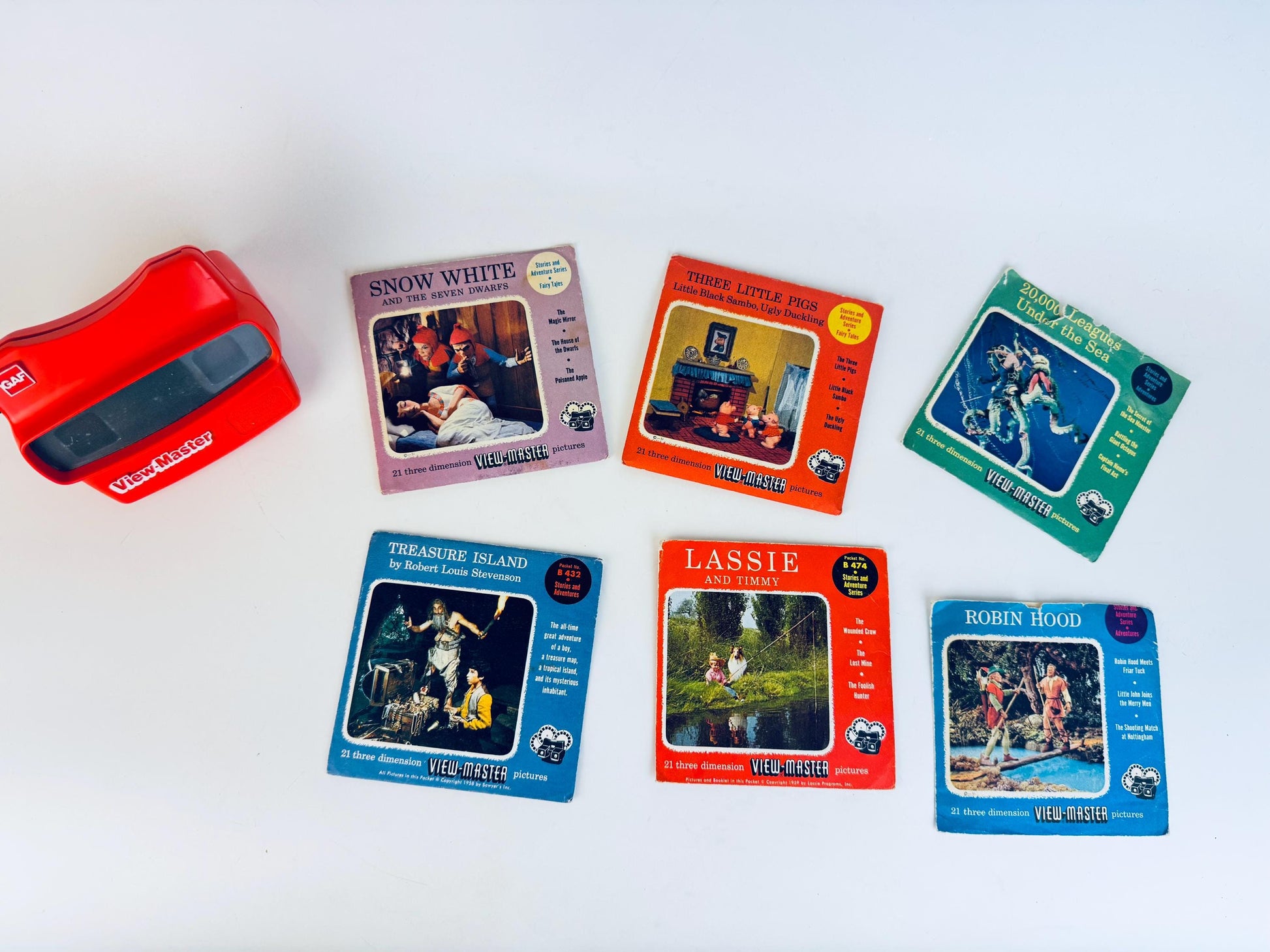 Collection of vintage View-Master Reels on a white background.
