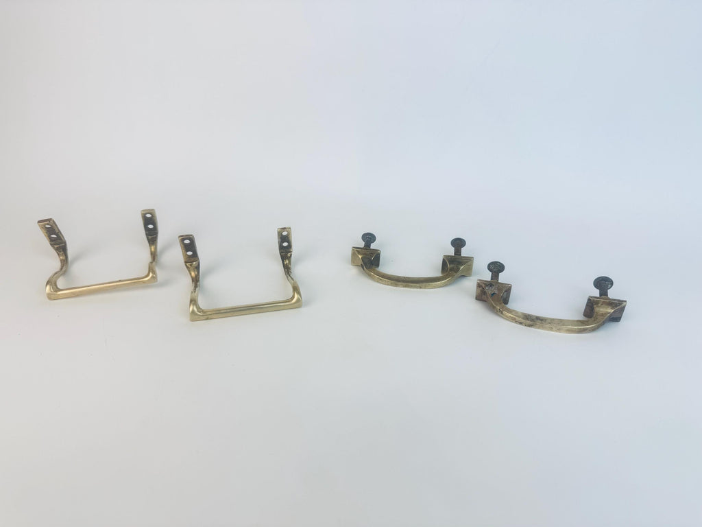 Brass handles on a white background. 