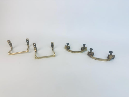Brass handles on a white background. 