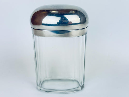 Vintage 1970s vanity jar with sterling silver dome lid and clear fluted glass base.